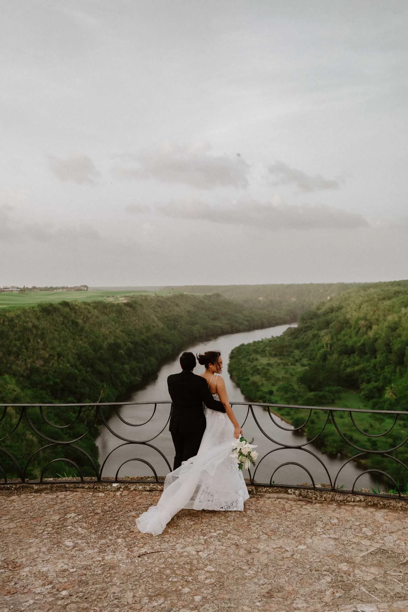 Couple looking into Rio Chavon in Altos de Chavon