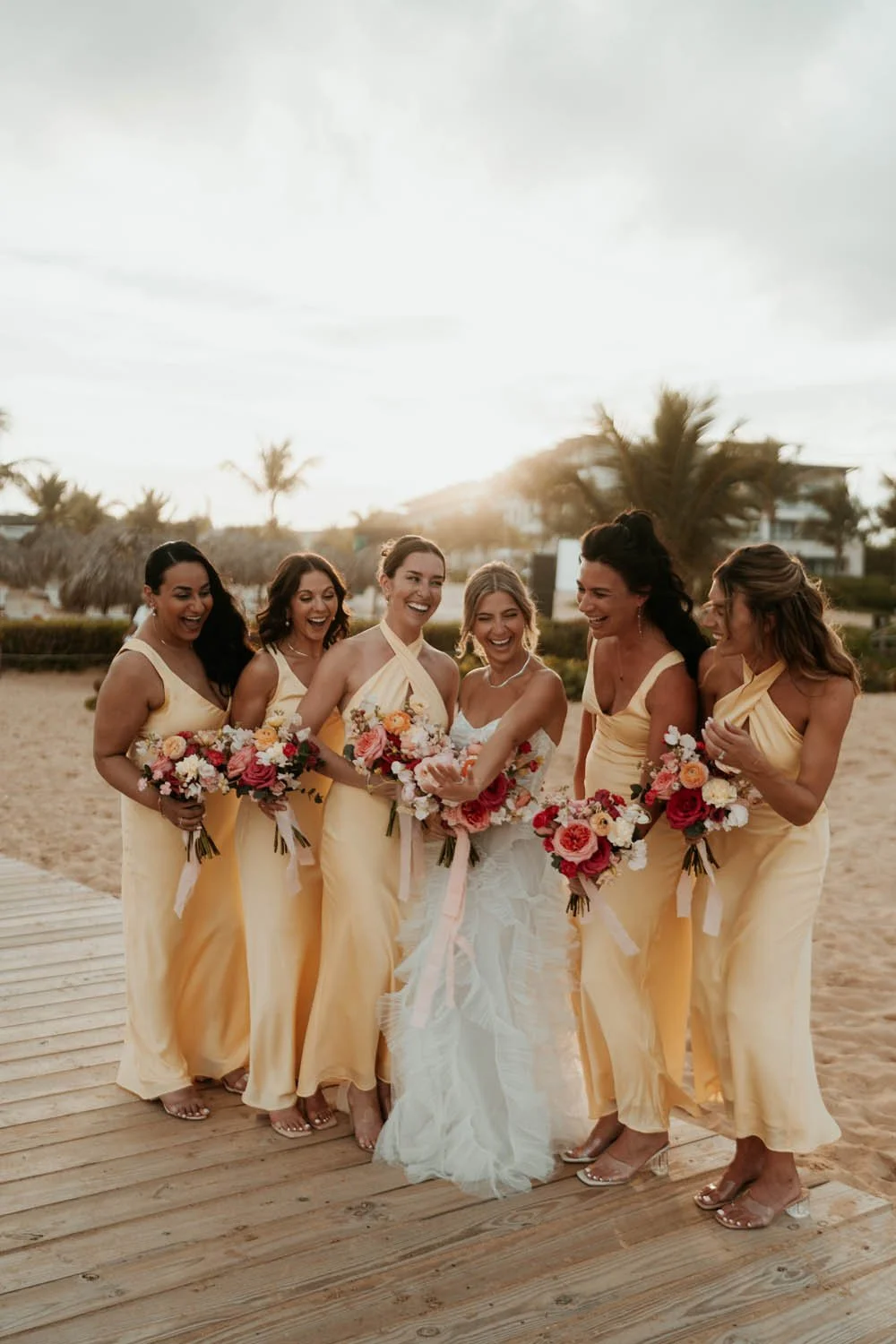 bride showing off her ring to her bridemaids