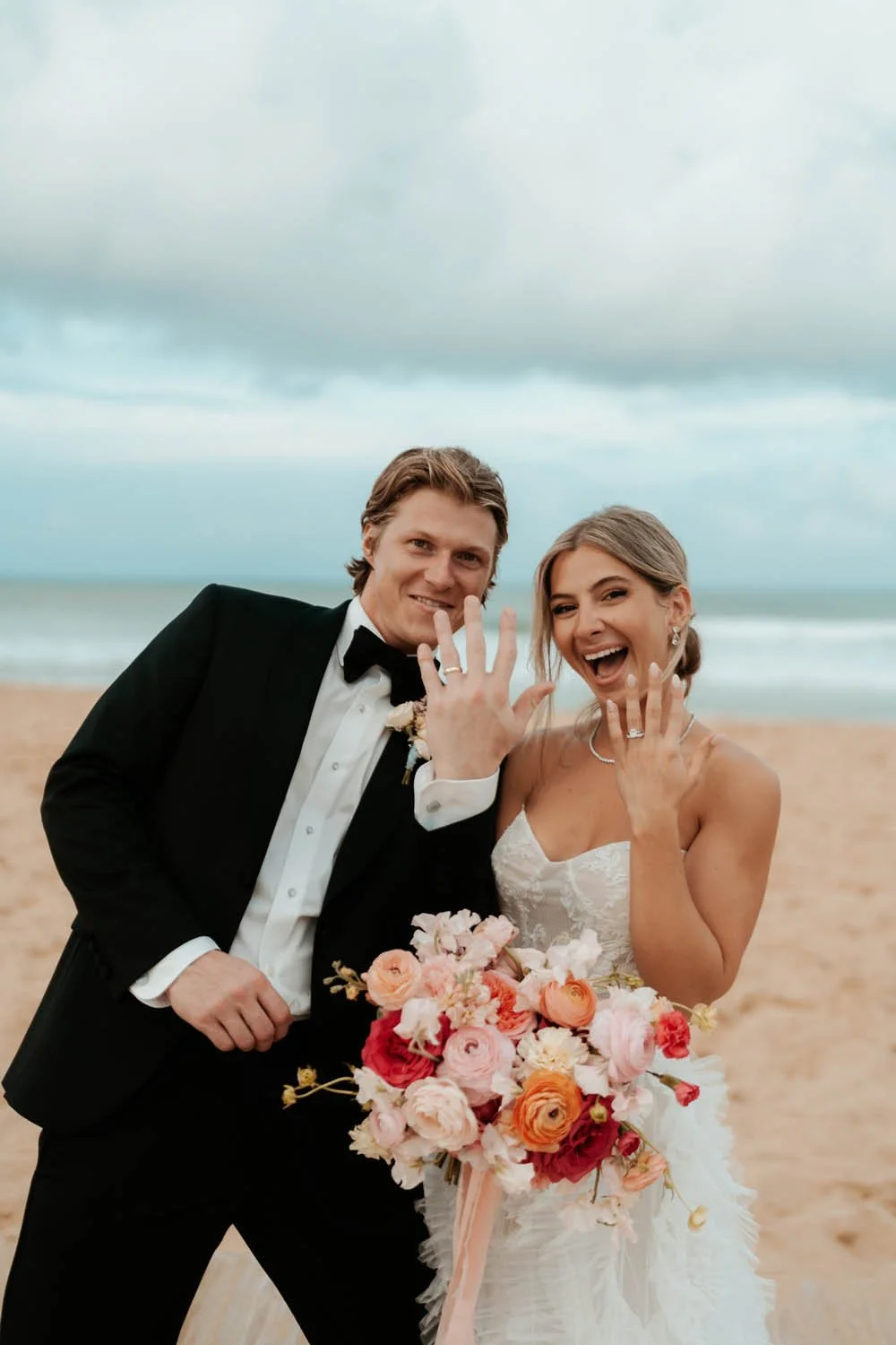 recently marry couple showing off their rings after getting marry in dreams macao beach punta cana