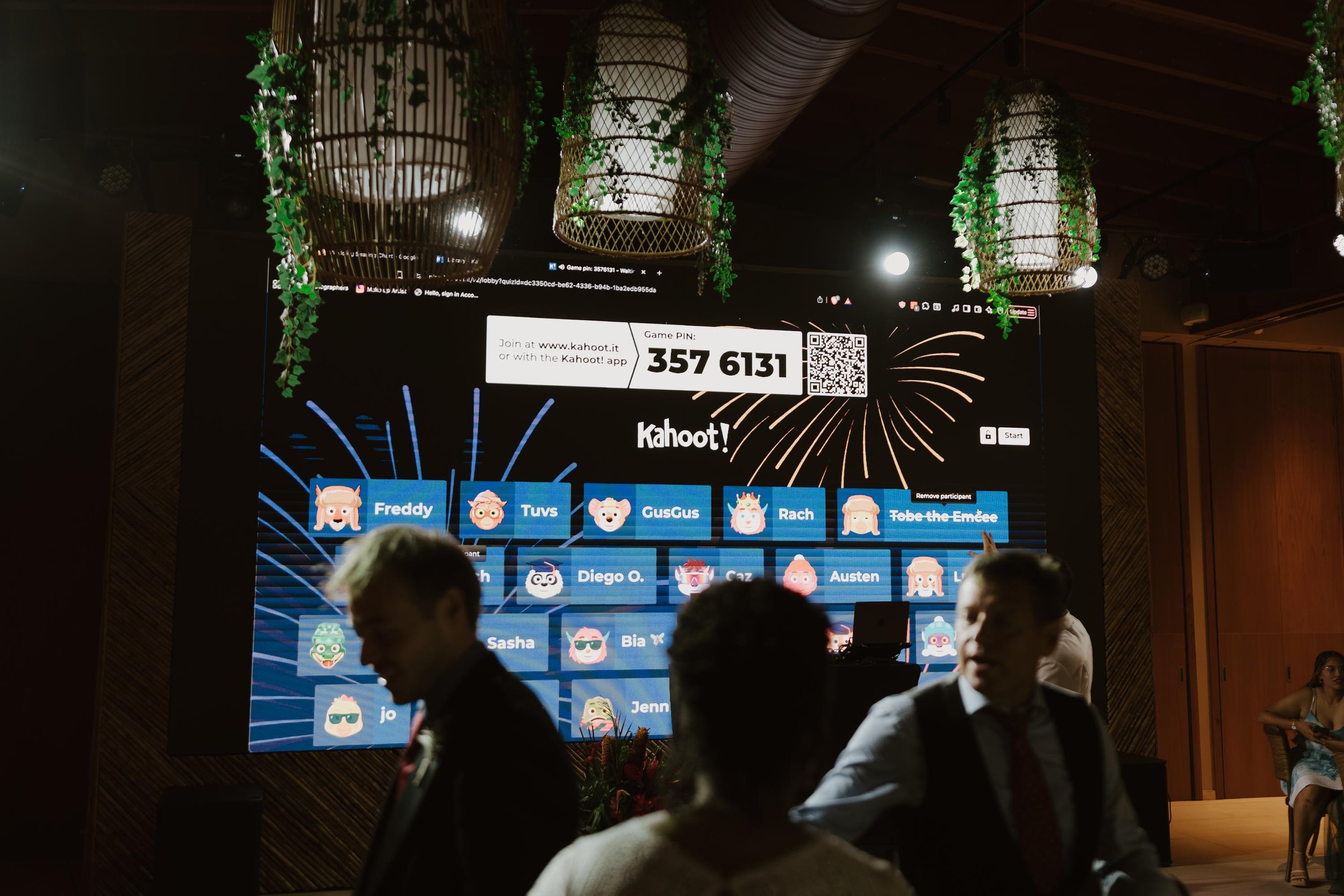Candid and energetic wedding reception party in Punta Cana, with guests dancing and celebrating under warm lights