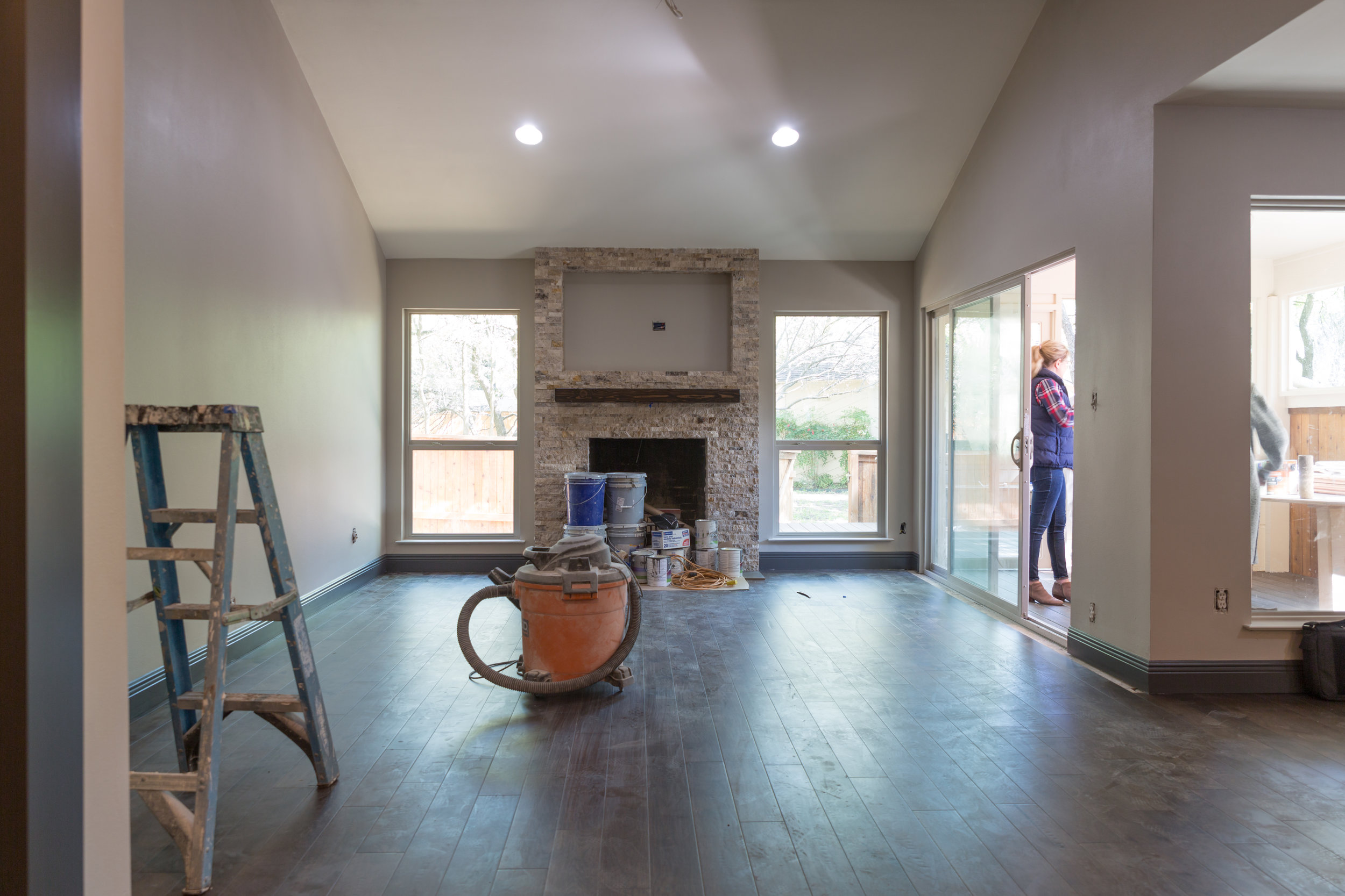 Townhome makeover with new flooring and stone firelpace