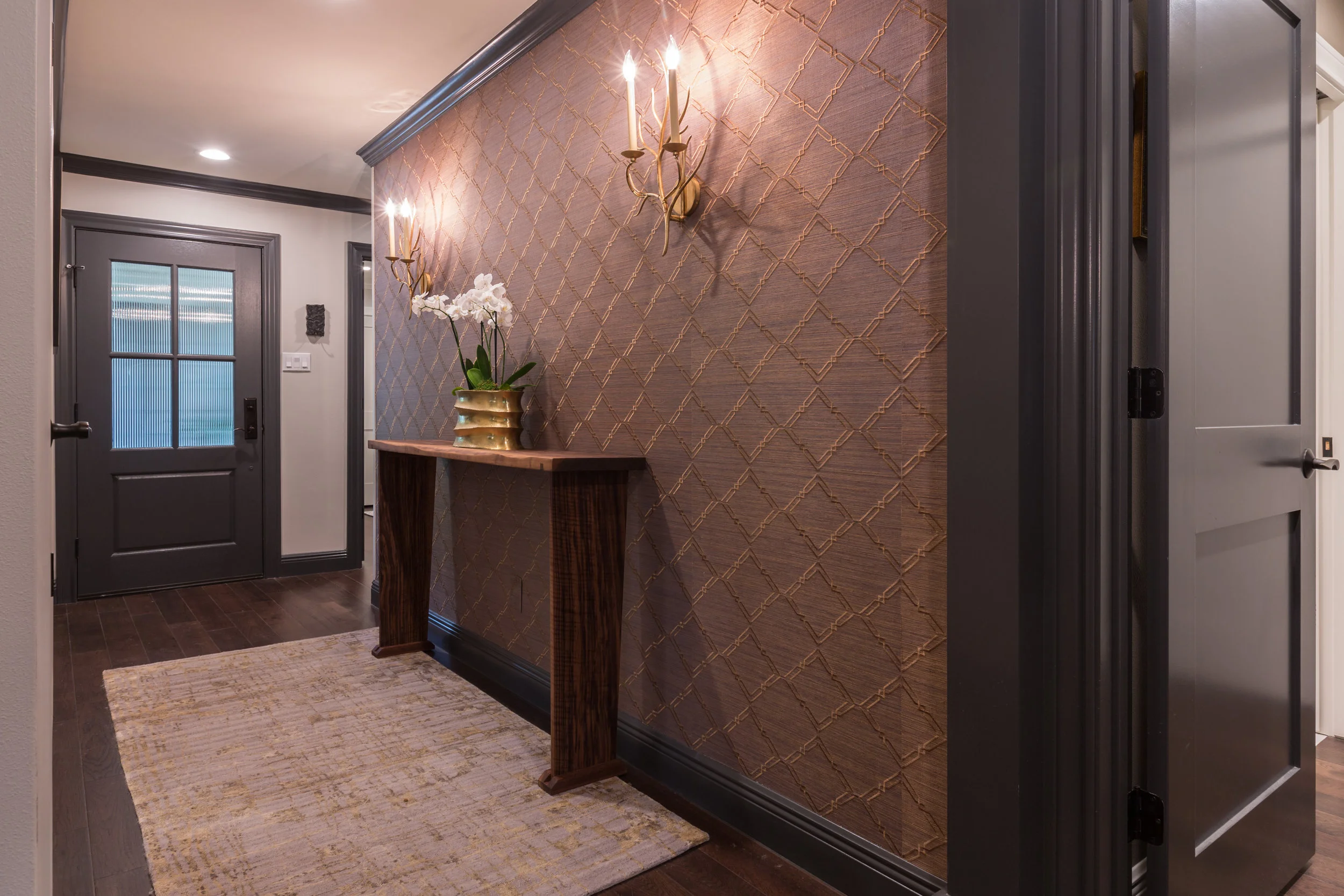 Renovated central austin condo with accent hallway wall