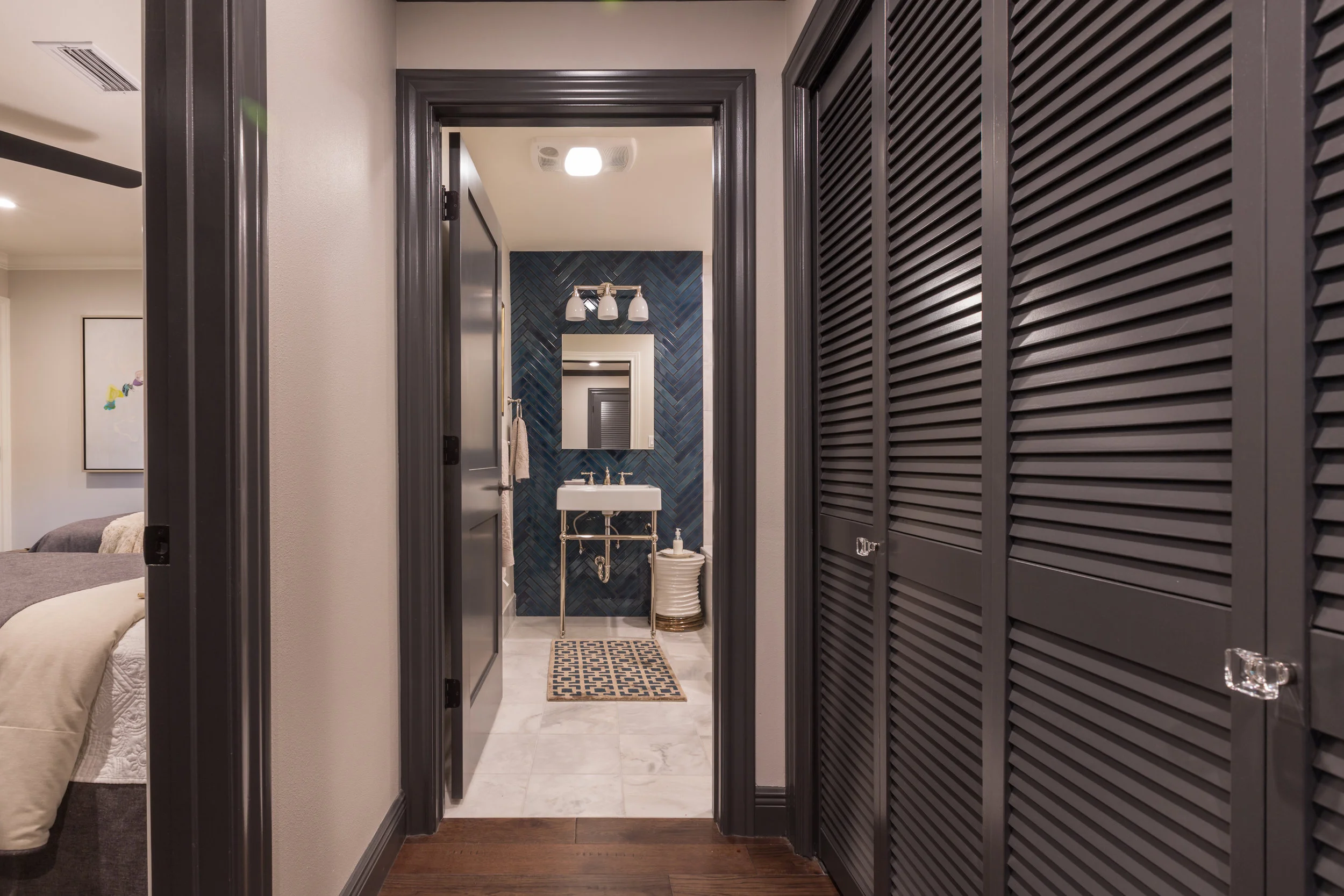 Herringbone guest bathroom tile