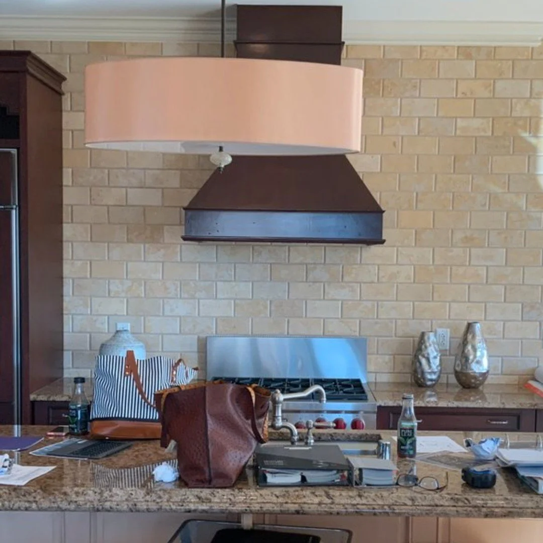 Gorgeous custom metal hood and Visual Comfort pendants at a Dallas client's home!