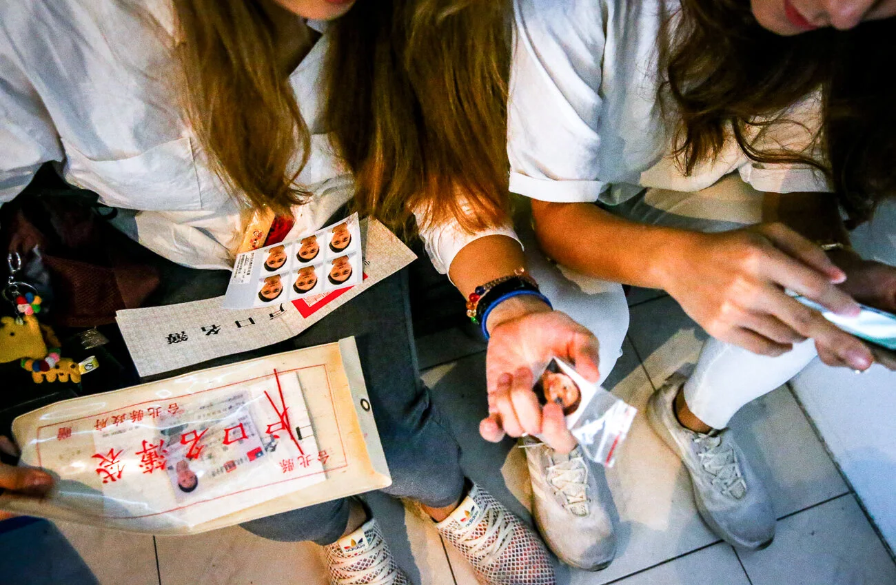 Amber Wang and Kristin Huang prepare the documents for marriage registration and check if they lost anything..jpg