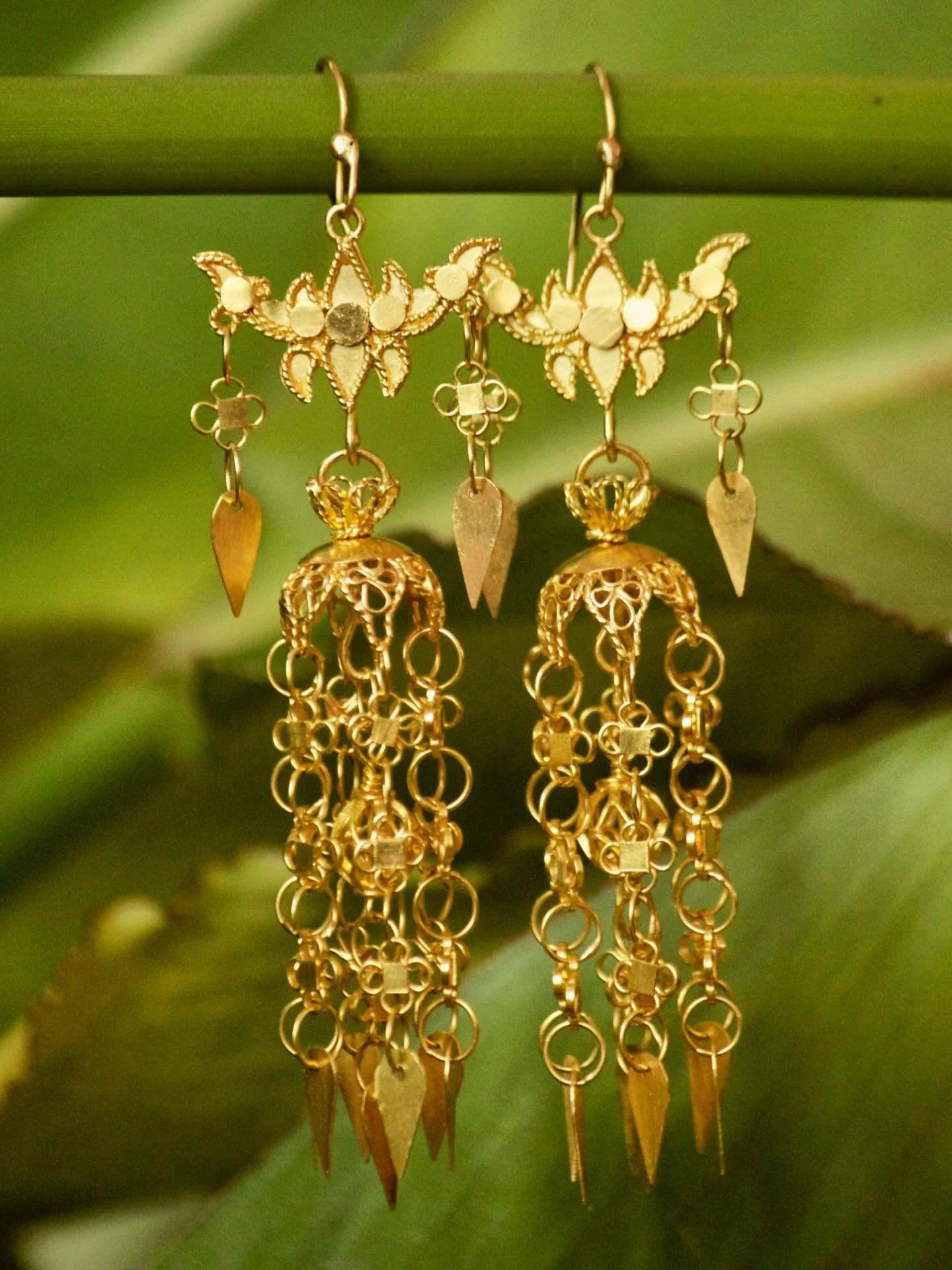 One of the very first of the ‘Hoi Sang, Unique Lao Jewelry’ collection. These 22k dangling earrings are exact replicas of family heirloom earrings. 
‘Hoi Sang’ was the first project I created 14 years ago to help preserve and