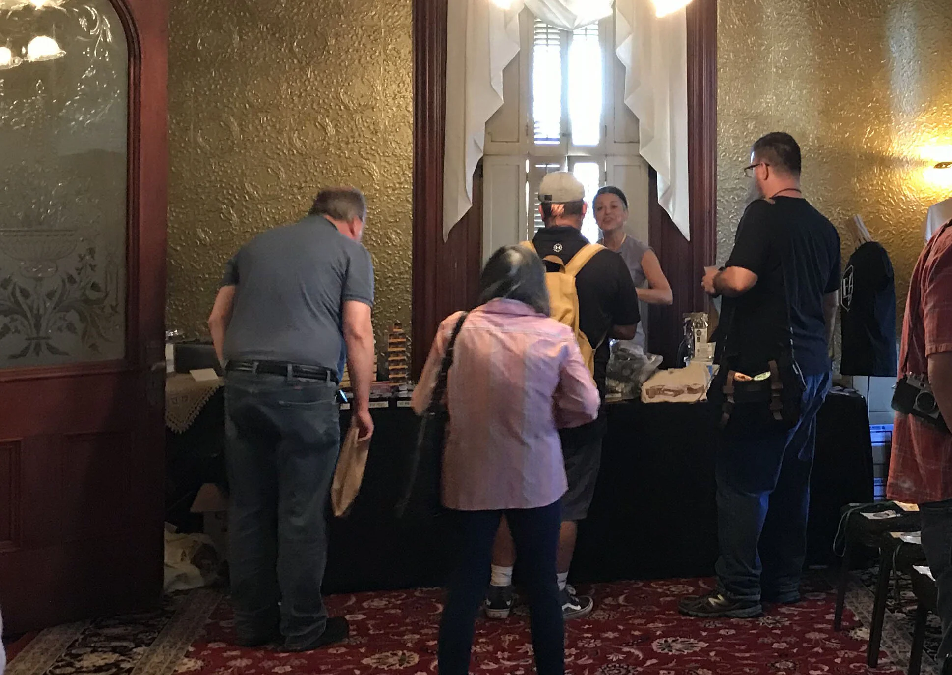 Chris visiting the Film Photography Project’s merchandise table (you always need more film). (Photo by Sam Warner)