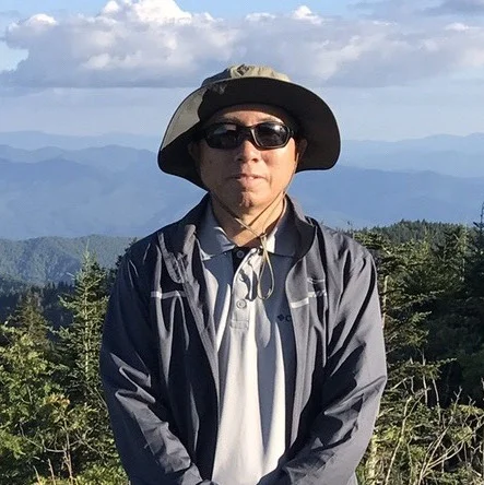 Yuezhong Wang is a professional photographer and entrepreneur, who has been practicing 48 different styles of Yang Shi Tai Chi since 2006. He has received multiple awards in Tai Chi competitions, including winning second place in the City Tai Chi Collective Award. Wang has been teaching and training his employees on this meditative practice since 2007.