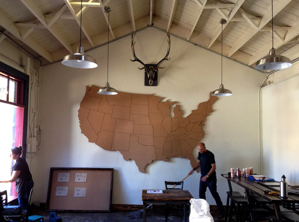 One of our early jobs allowed the opportunity to make a giant map for some dear friends — Homestate BBQ in Ashland, Oregon. Ashland sees a tremendous amount of tourism, and while musing on the future business the idea of having a map upon which people could pin their ‘home state’ emerged… We grabbed that idea and blew it up large, fabricating (and installing) a 12′ x 9′ cork map. Many thanks to the large bed CNC Router. More soon…