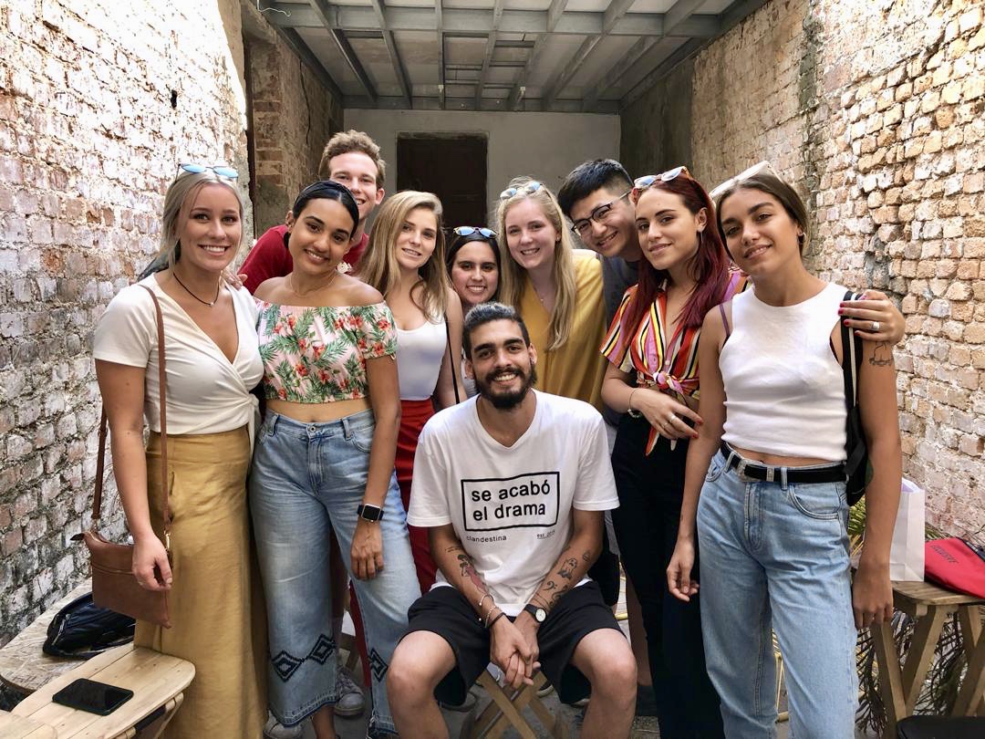 IU Kelley students meet with Cuban music group Colors at independent art gallery Oficios.