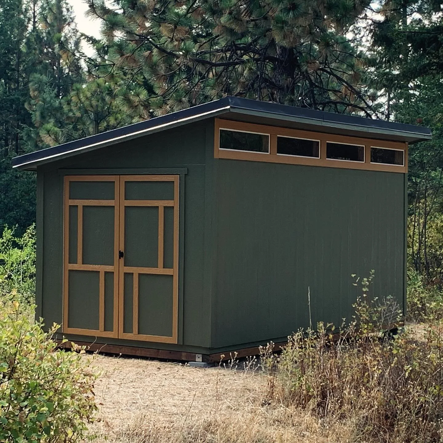 We built a shed over the summer.  I have to say, for a kit, it was pretty good.  Super happy with the end result!  Given the design, we thought a mid-century looking door accent was the way to go.