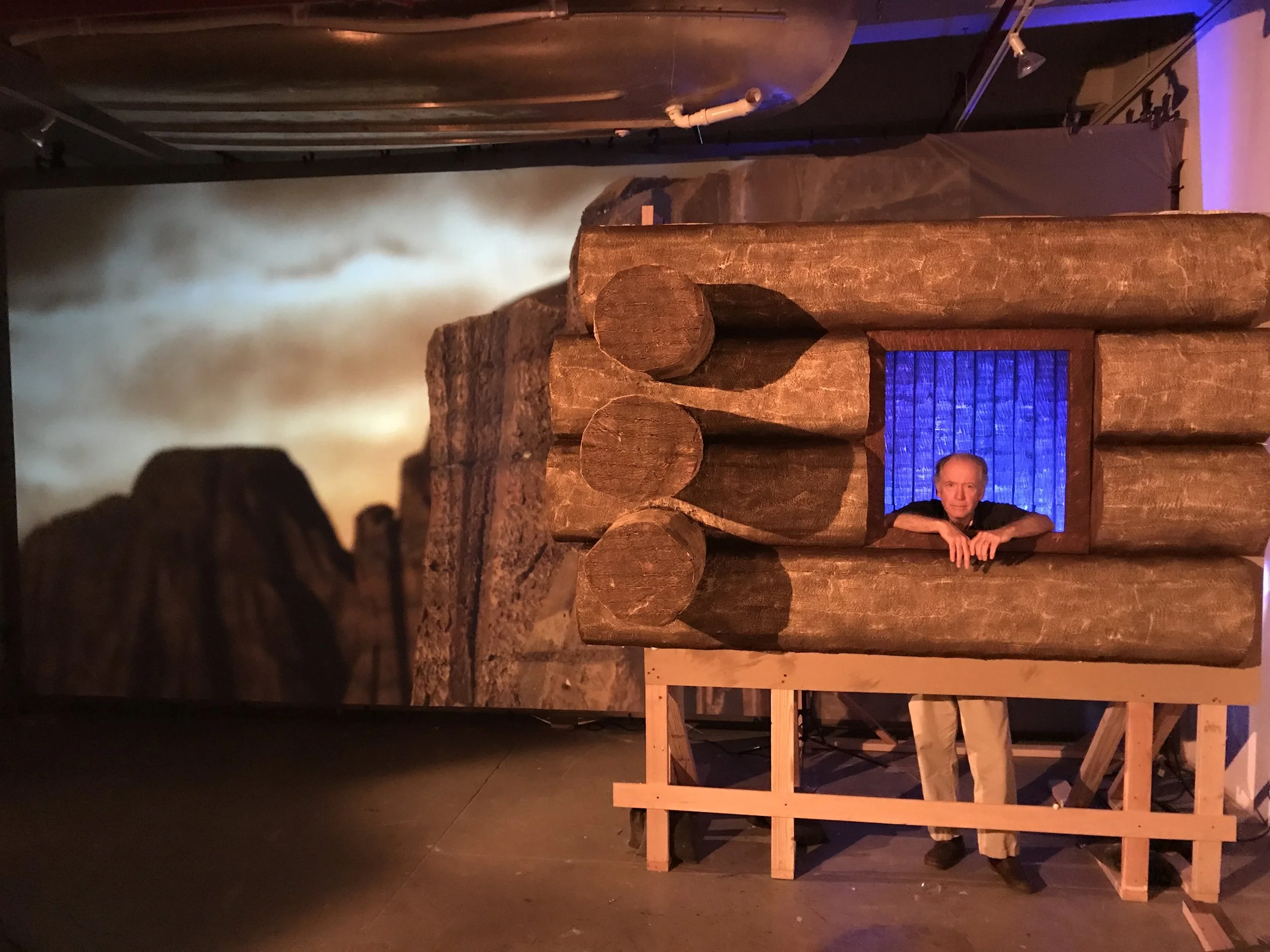 Actor J. Dixon Byrne on the cabin set