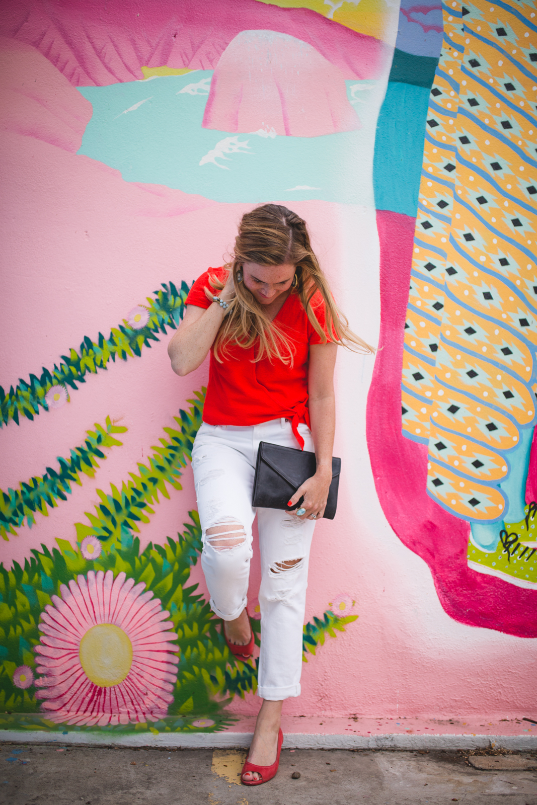 Tigist Clutch in Black, The Slouch Pant in Lucely Wash