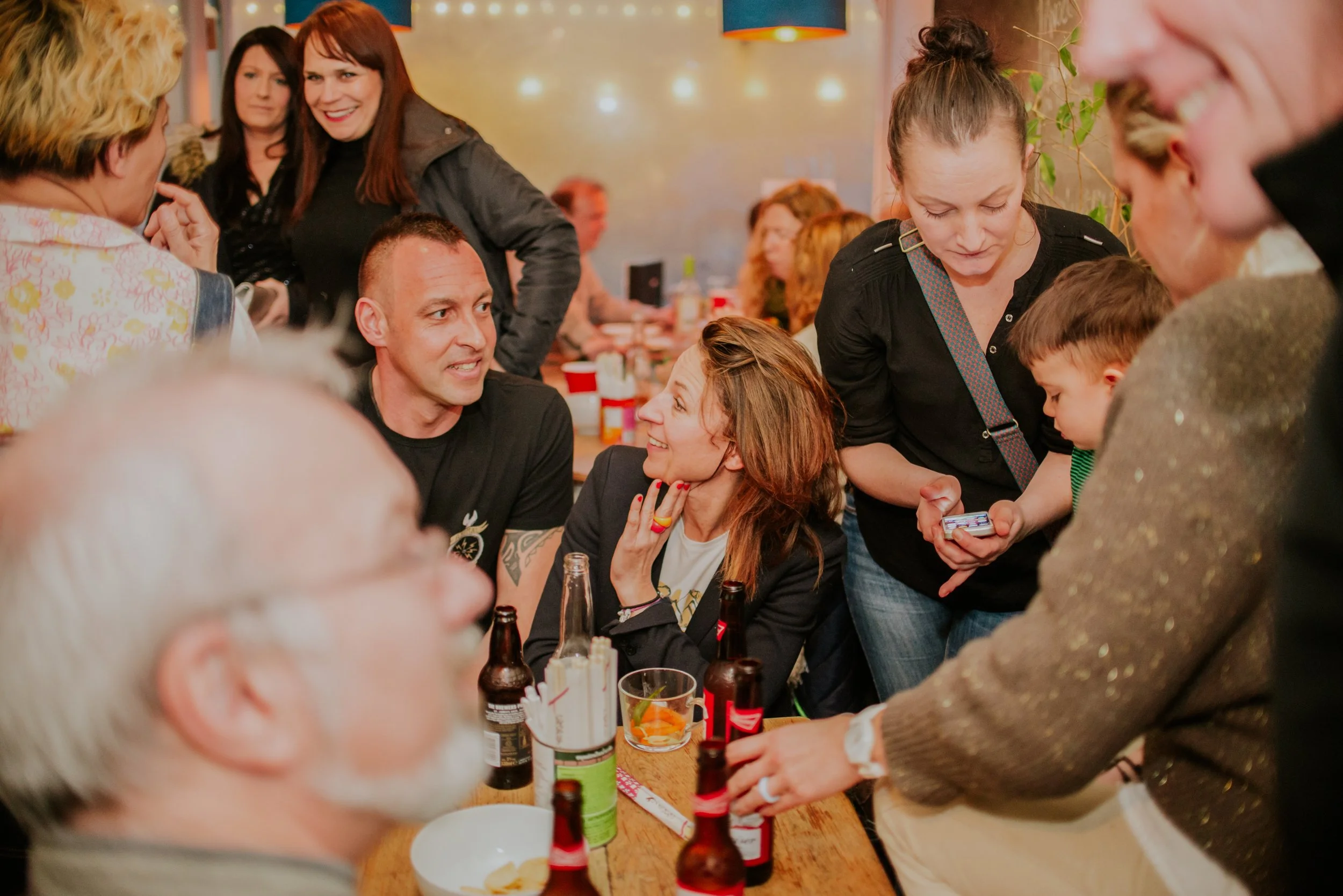  Table of people at restaurant launch in St Leonards on Sea, Hastings 