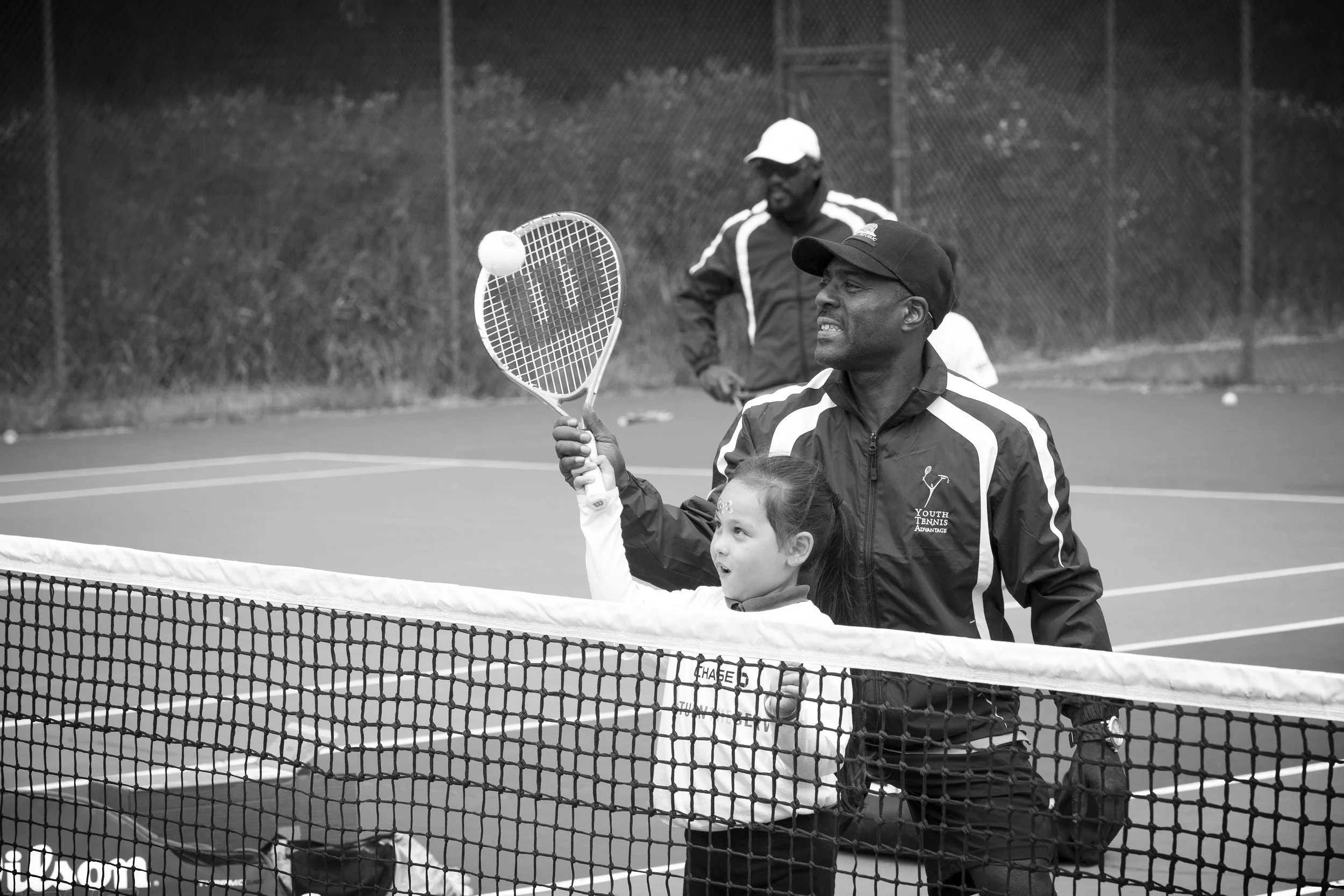 YTA_Larry and Terry on court with student.jpg