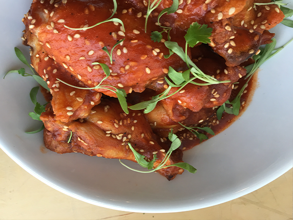 sriracha doused wings kitchen 12000.png