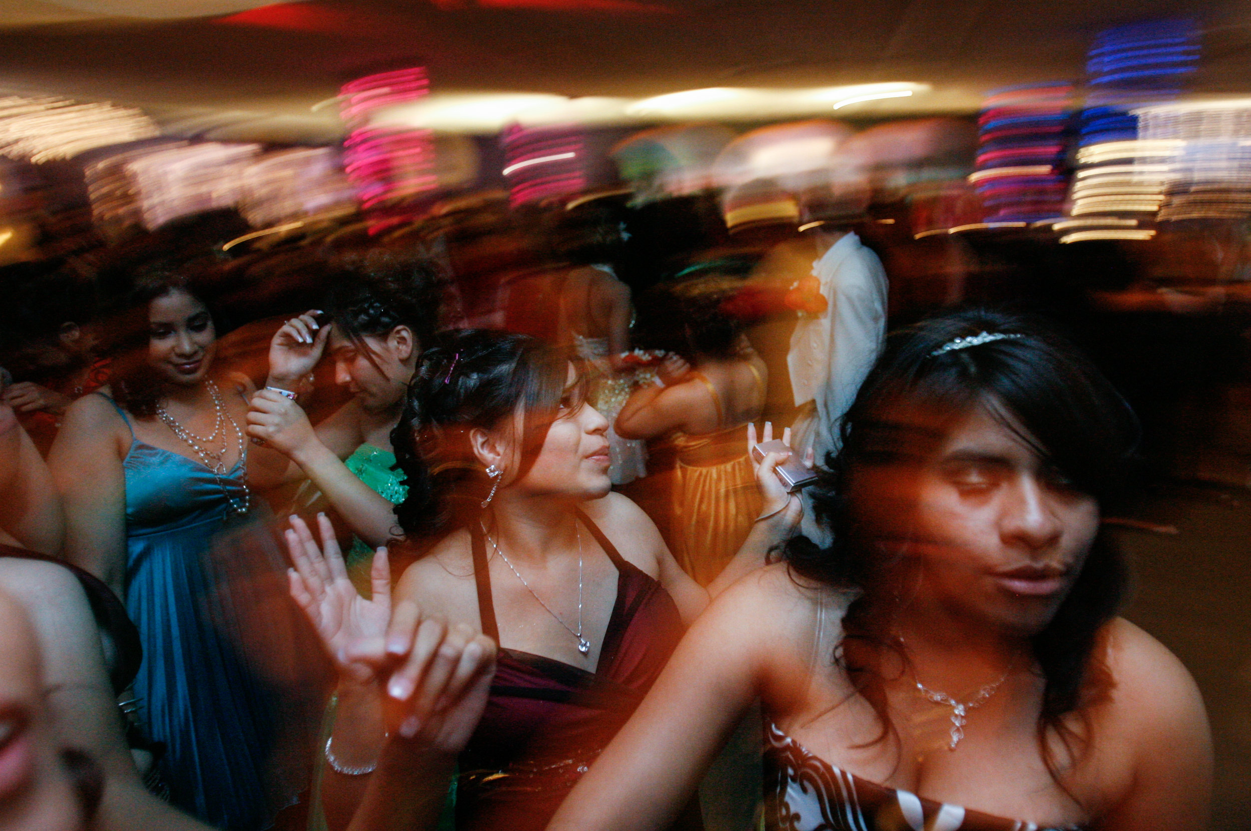  Deana Martinez, 17, center, dances at the Odessa High School prom April 26, 2008, at the Ector County Coliseum in Odessa, Texas. 