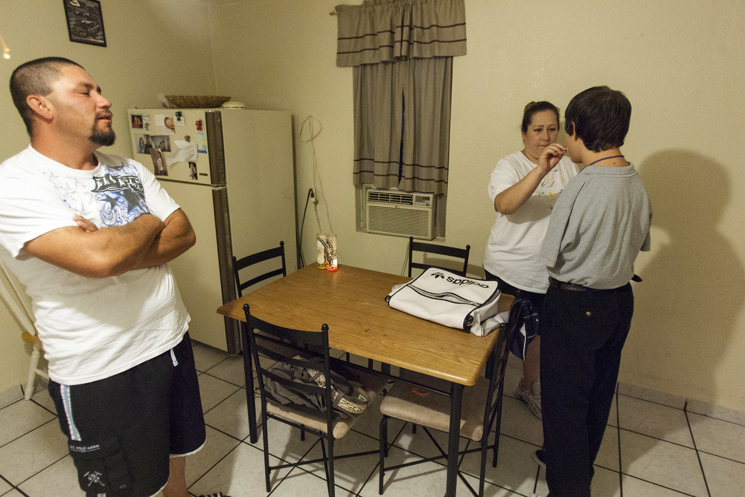  Jesse Flores readies for the school day Friday, May 28, 2010, at home in Odessa, Texas. His parents, Yari and Francisco Flores, help when needed. They were surprised by Flores' missing limbs when he was born as they had not scheduled an ultrasound d