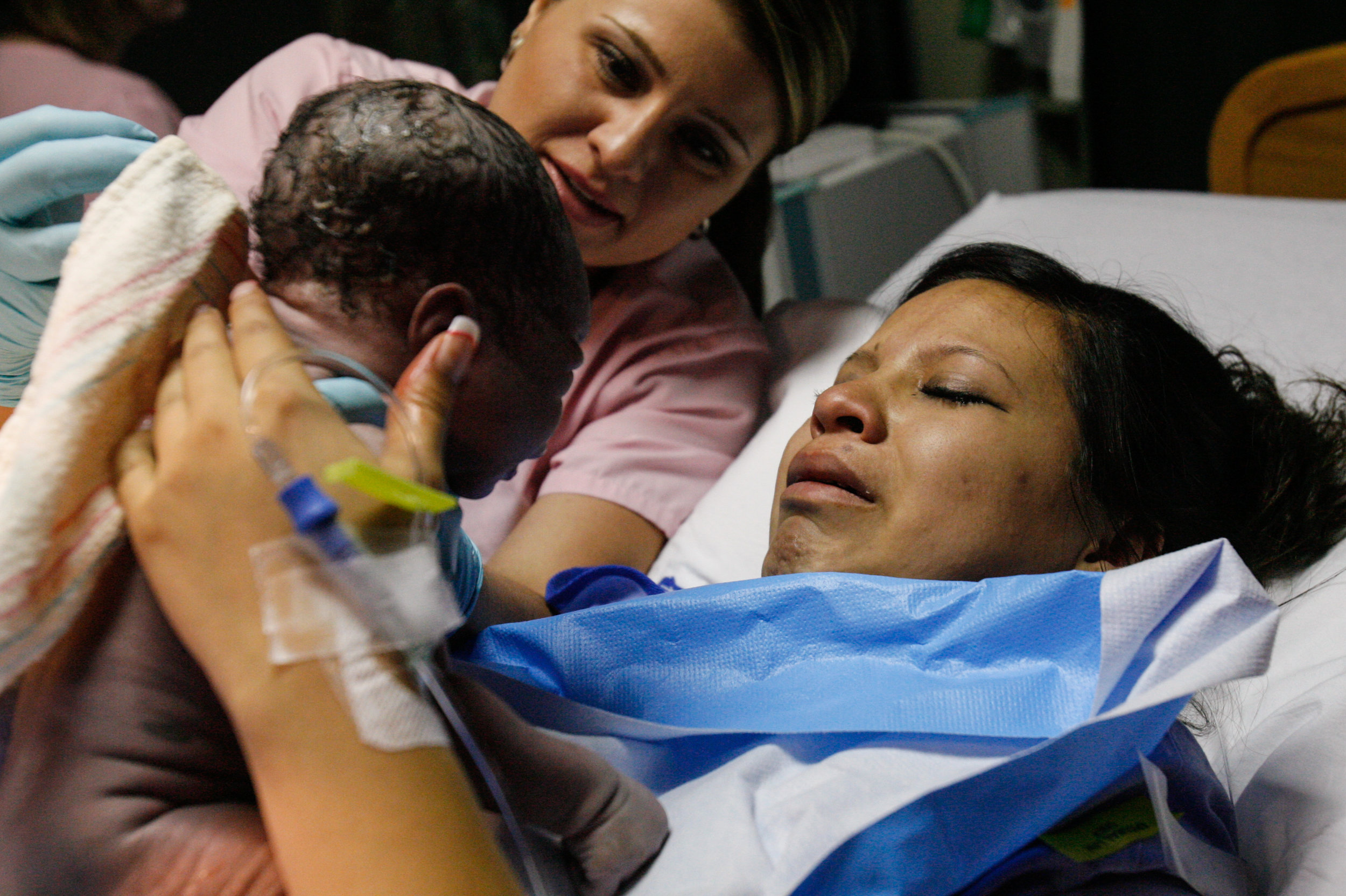  Deana Martinez, 17, right, holds her newborn, Lavon Sutton, after she delivered May 21, 2008, at Medical Center Hospital in Odessa, Texas. With Martinez is registered nurse Kasey Birchfield, who helped her through the labor and delivery. 