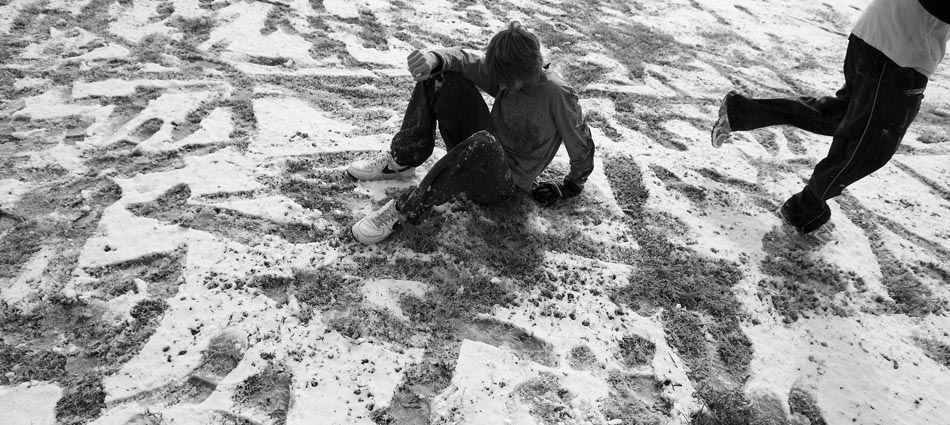  Touch football in the snow Friday, Dec. 4, 2009, at Mike Neeley Park in Odessa, Texas. 