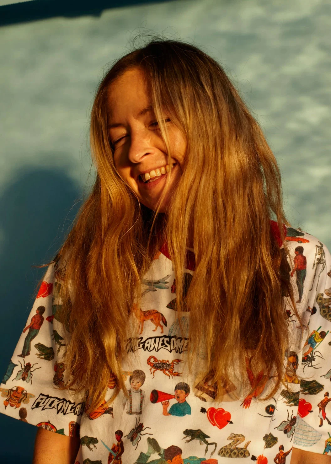Claire Thomson, beauty director, wears t-shirt from Supply Store.