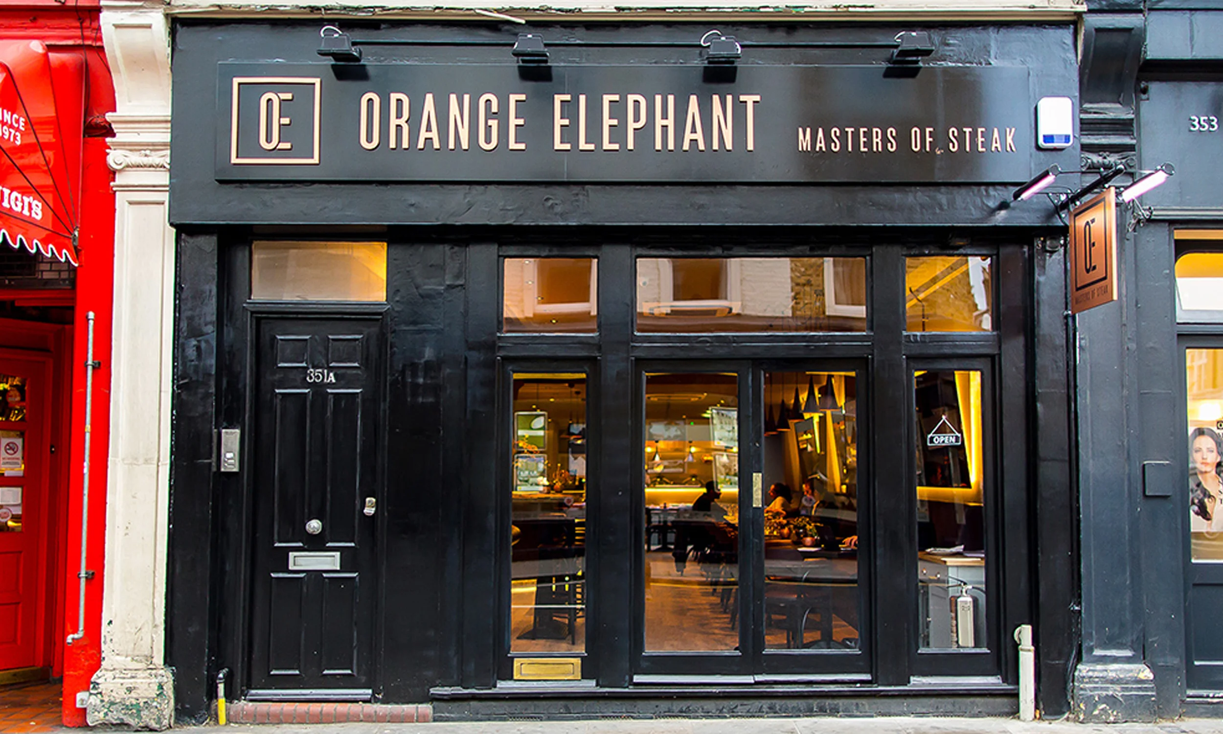 Orange Elephant shopfront exterior signage graphic design.