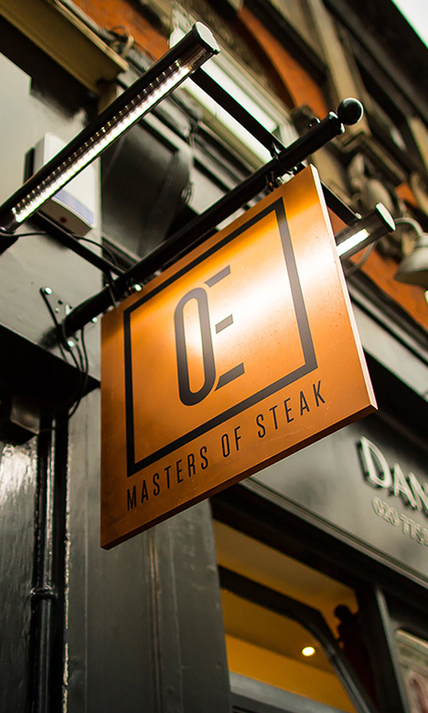 Orange Elephant exterior signage graphic design.