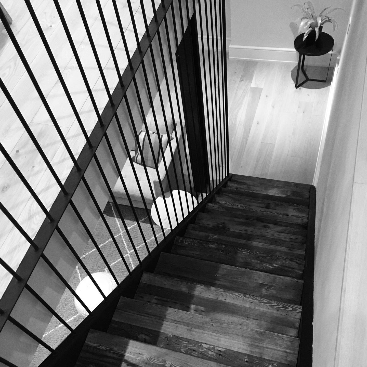 Another shot - reclaimed wood studs made into stair treads.