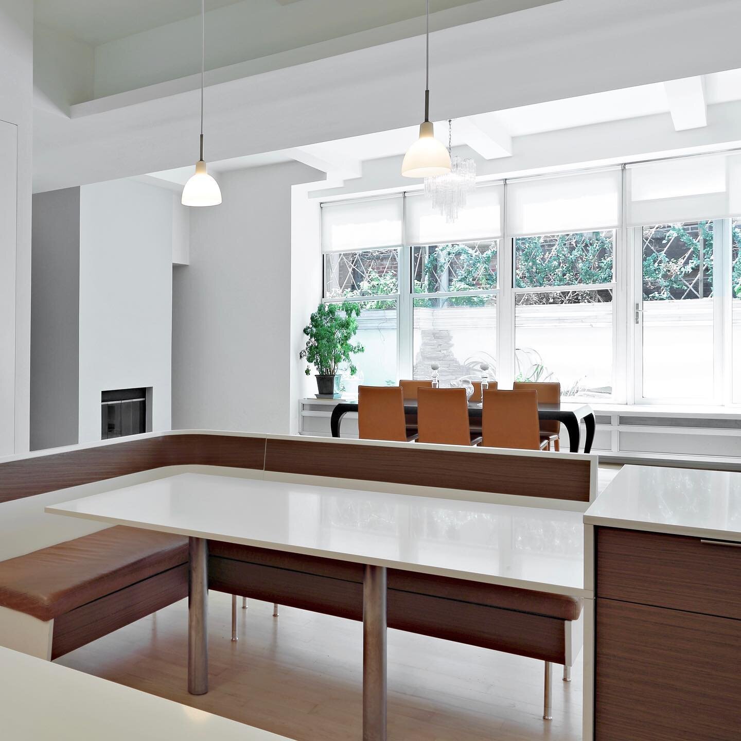 A banquette integrated into kitchen millwork. Tribeca loft renovation.