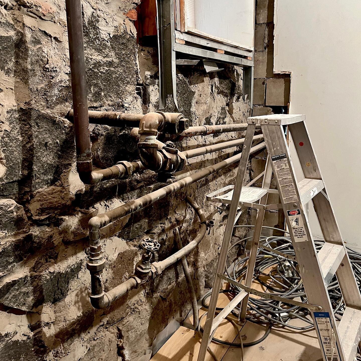 The mystery of the weird wall bump is solved. We learned from the contractor that this knot of piping is not going anywhere without the risk of damaging the incoming water service. So we&rsquo;re stuck with this, but we can design around it. It will 