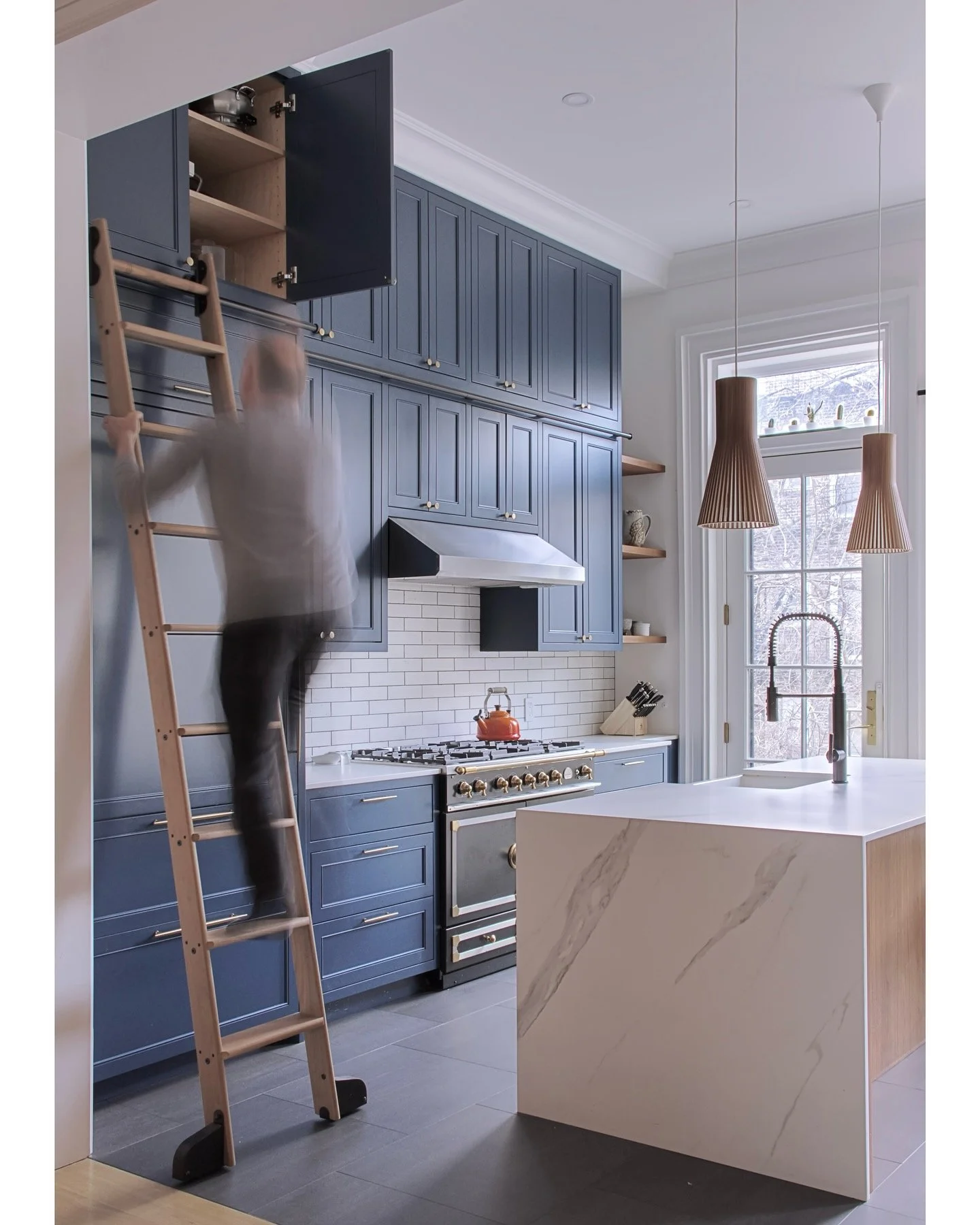 A rear parlor kitchen in a townhouse is a very challenging design exercise. For this one with a full wall of windows and one door to the rear yard and very small footprint, we used the generous ceiling height to maximize functionality.
 
#architectur
