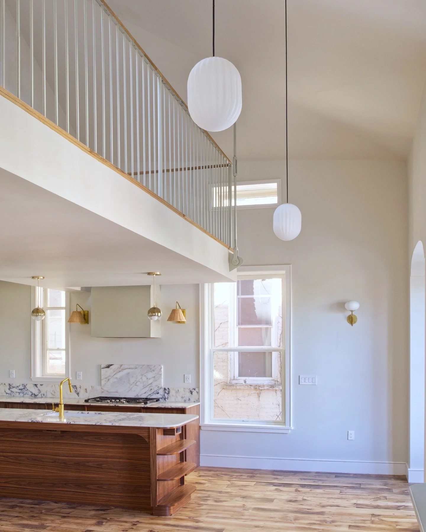 In our Pacific Street project we took advantage of an existing non-usable attic to create a dramatic double-height living/kitchen/dining room with a loft space suspended within it. We were thrilled to have this project featured in Open House New York
