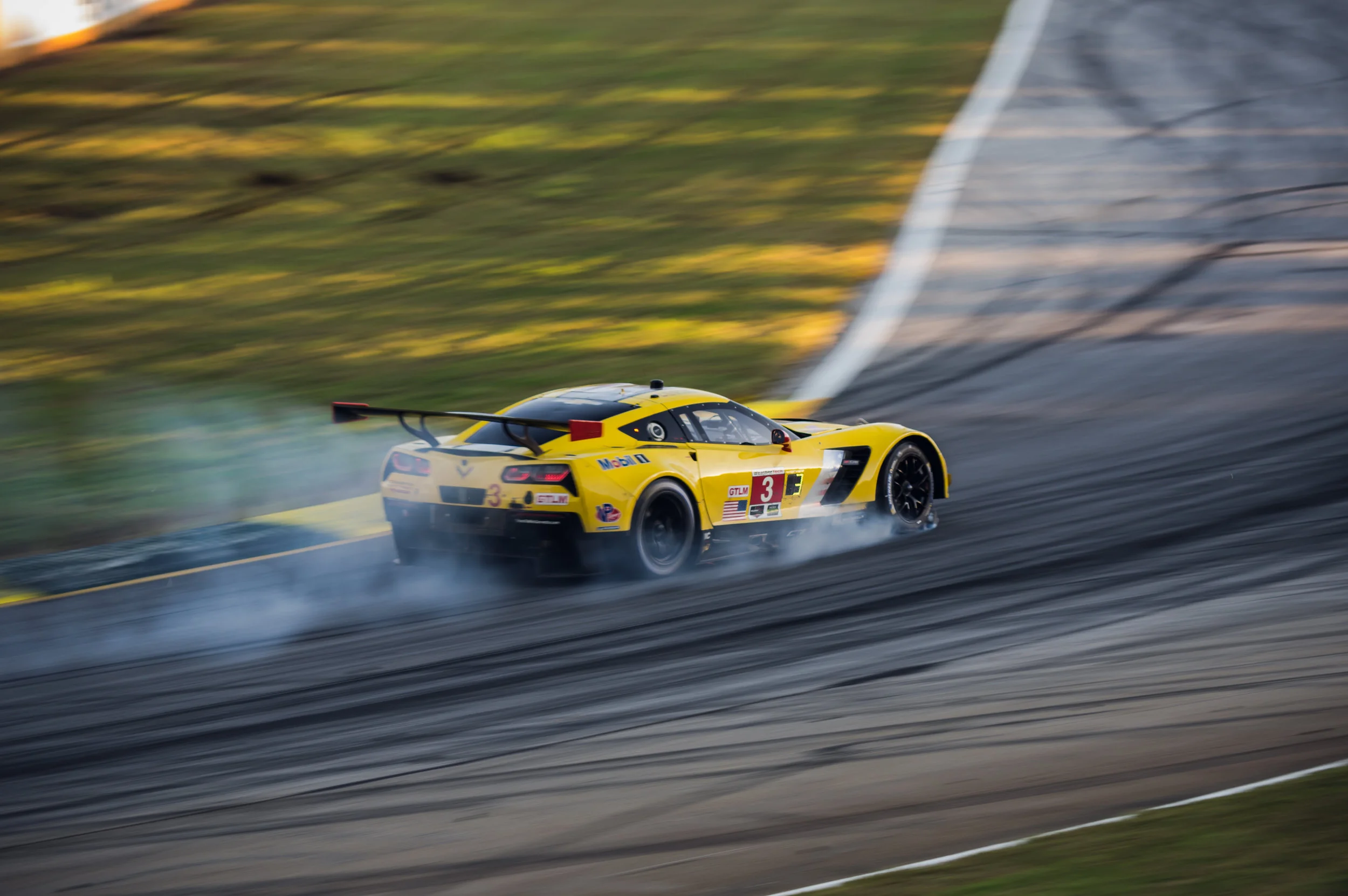 Vette after he just hit the wall coming out of a pitstop at dusk