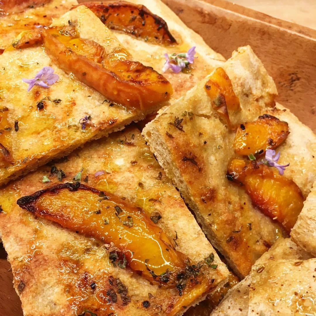 peach flatbread with rosemary blooms