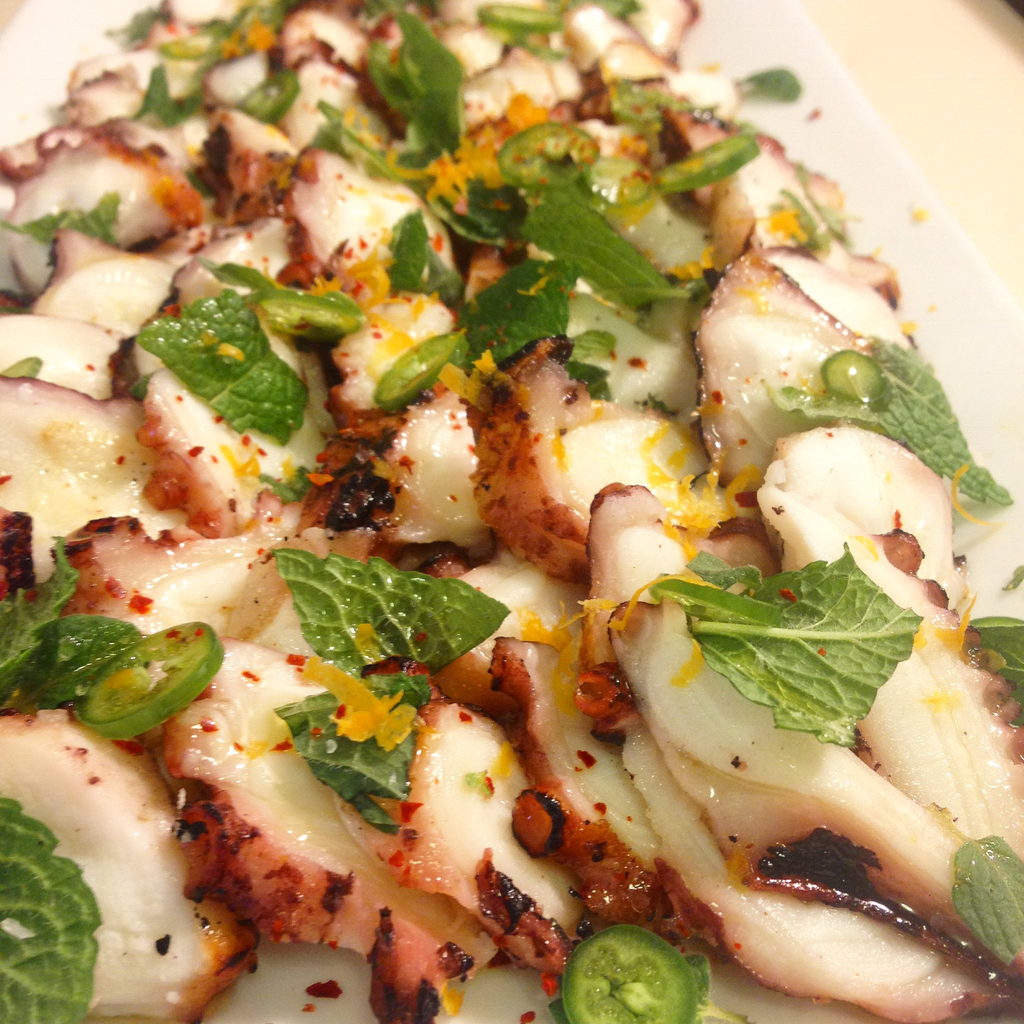 grilled octopus salad with mint, serrano chili, and meyer lemon