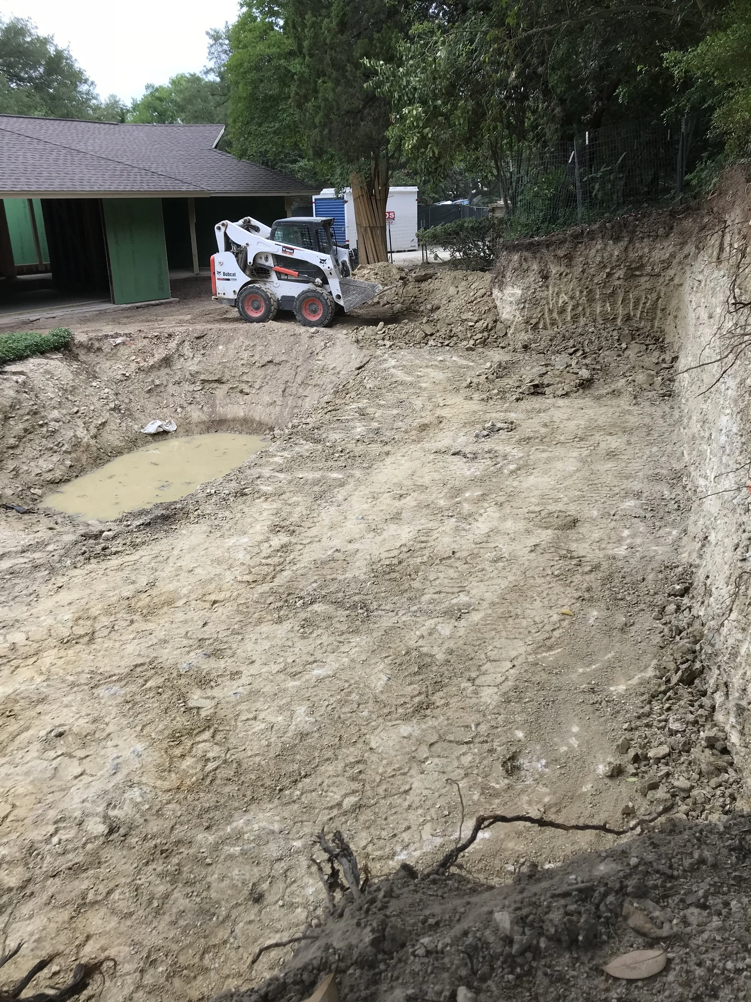 The service provided to the homeowner here included a pool demo and backyard excavation