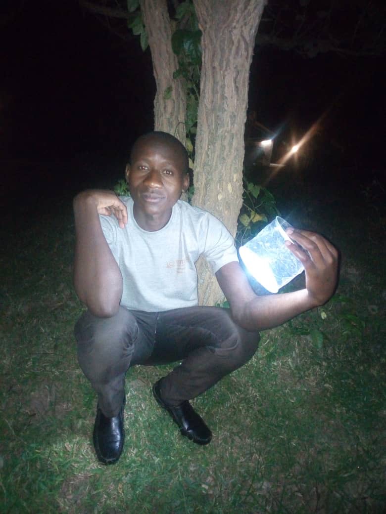 Hannington with solar lights.jpeg