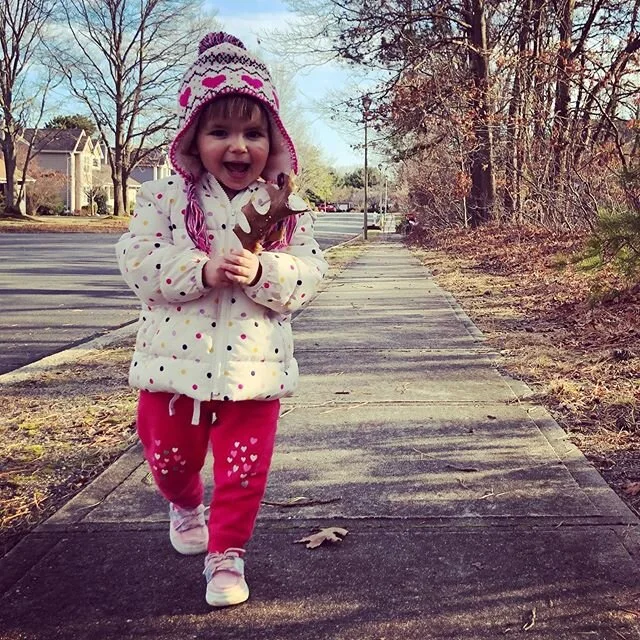 She&rsquo;s a leaf connoisseur now. #leavethestroller #1milewalk #love #polkadots #pinkpants #dimples