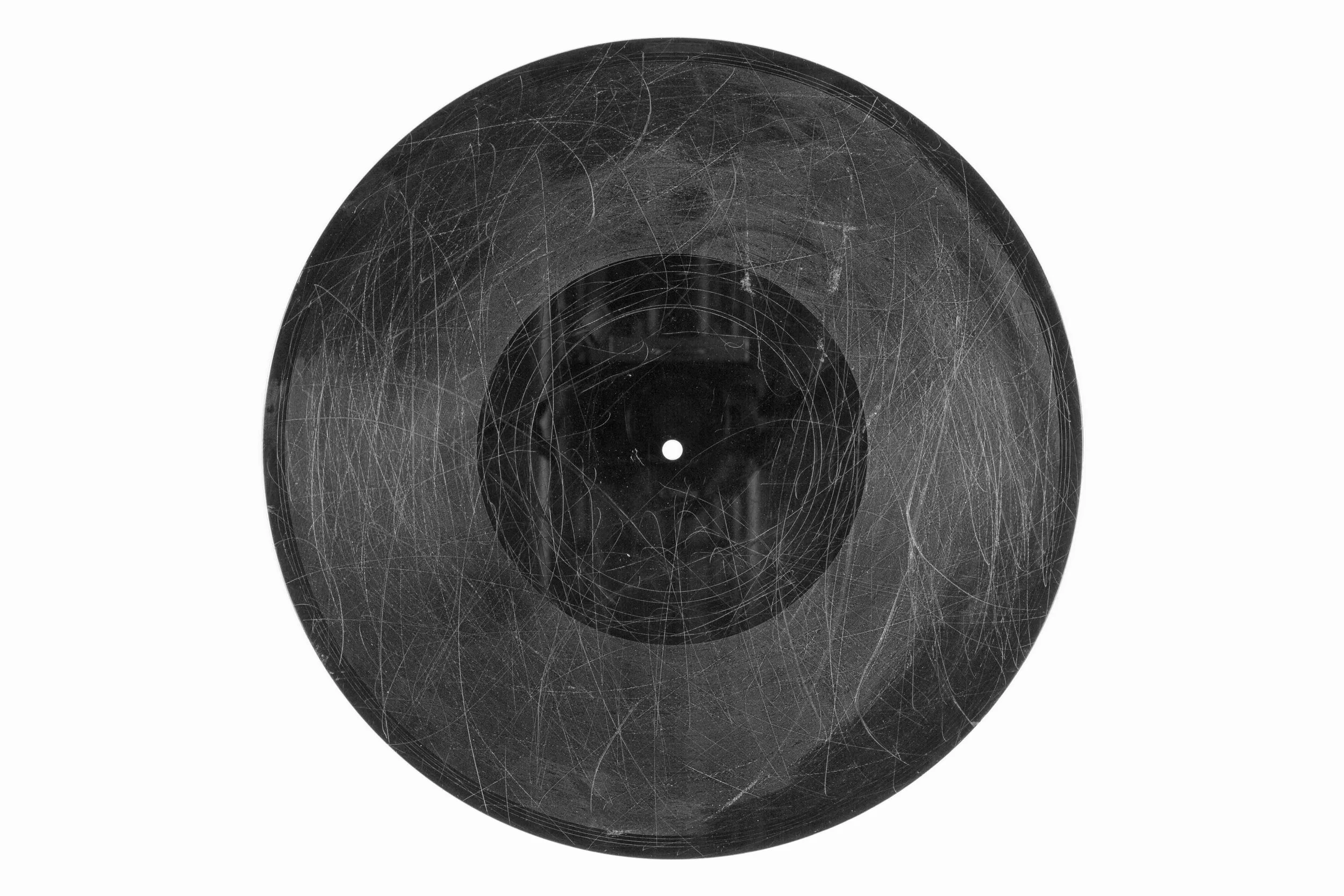 A very scratched vinyl record