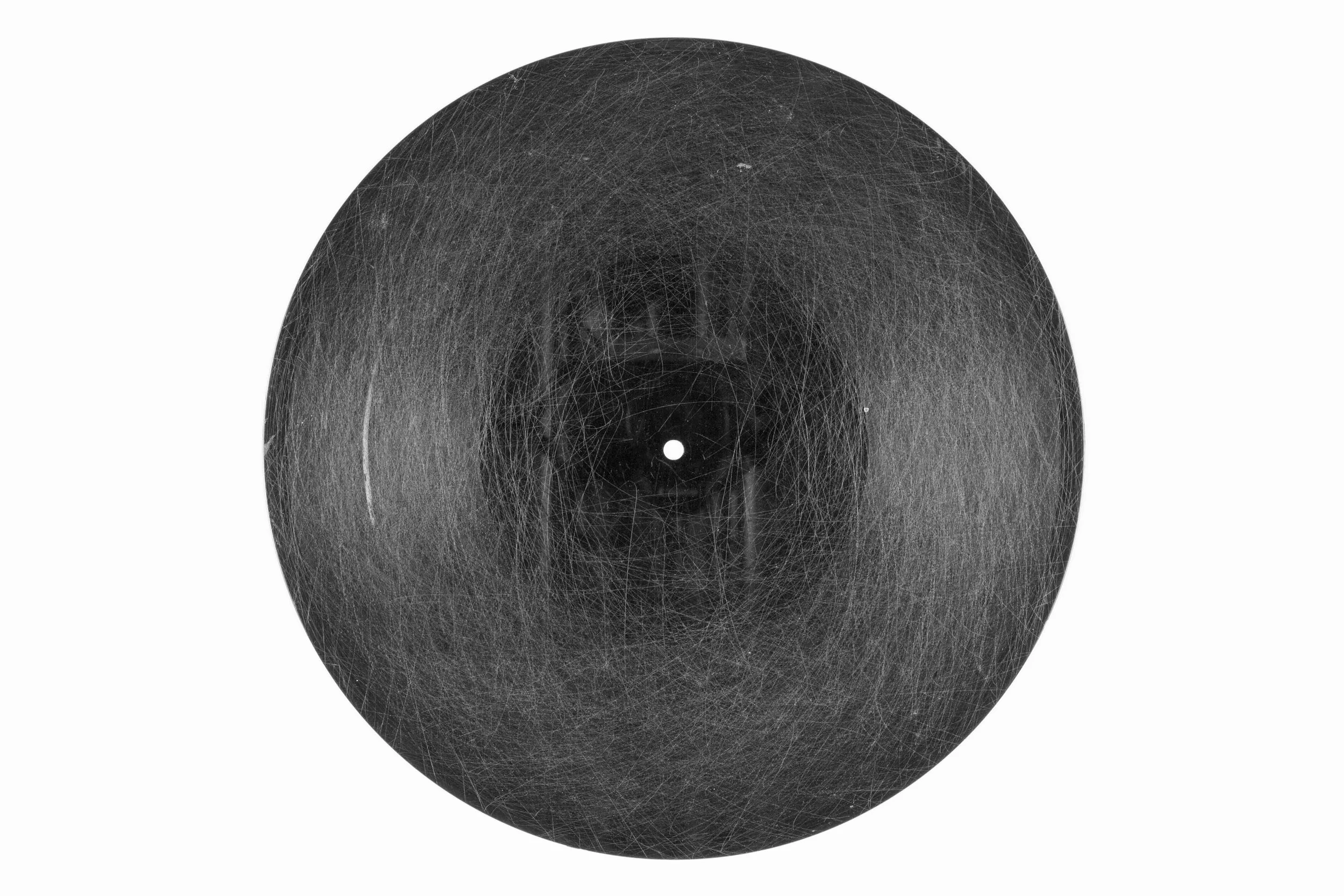 A very scratched vinyl record