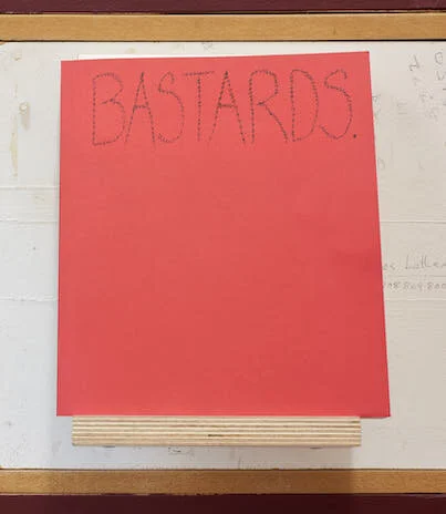 Cover of a book with the word - Bastards - in handwriting on a red background