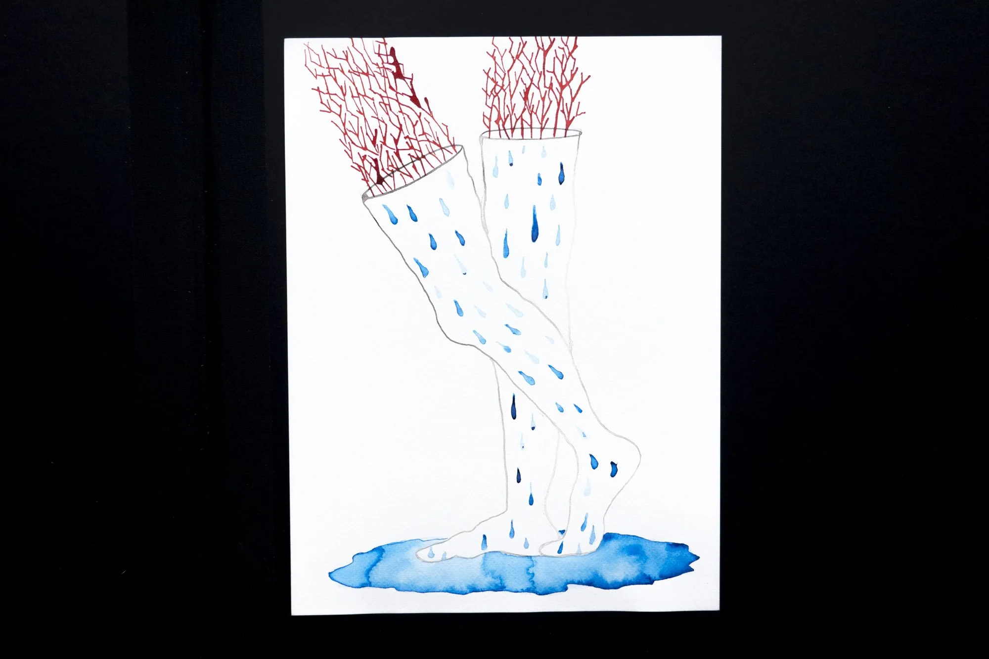 Ink drawing of legs dripping into a puddle with red veins appearing out of them