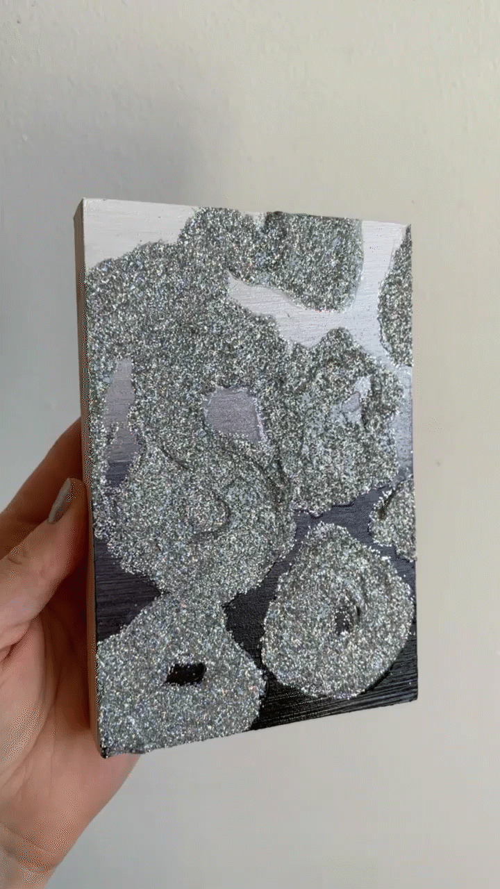 Black Gradient with Holographic Jewels.gif
