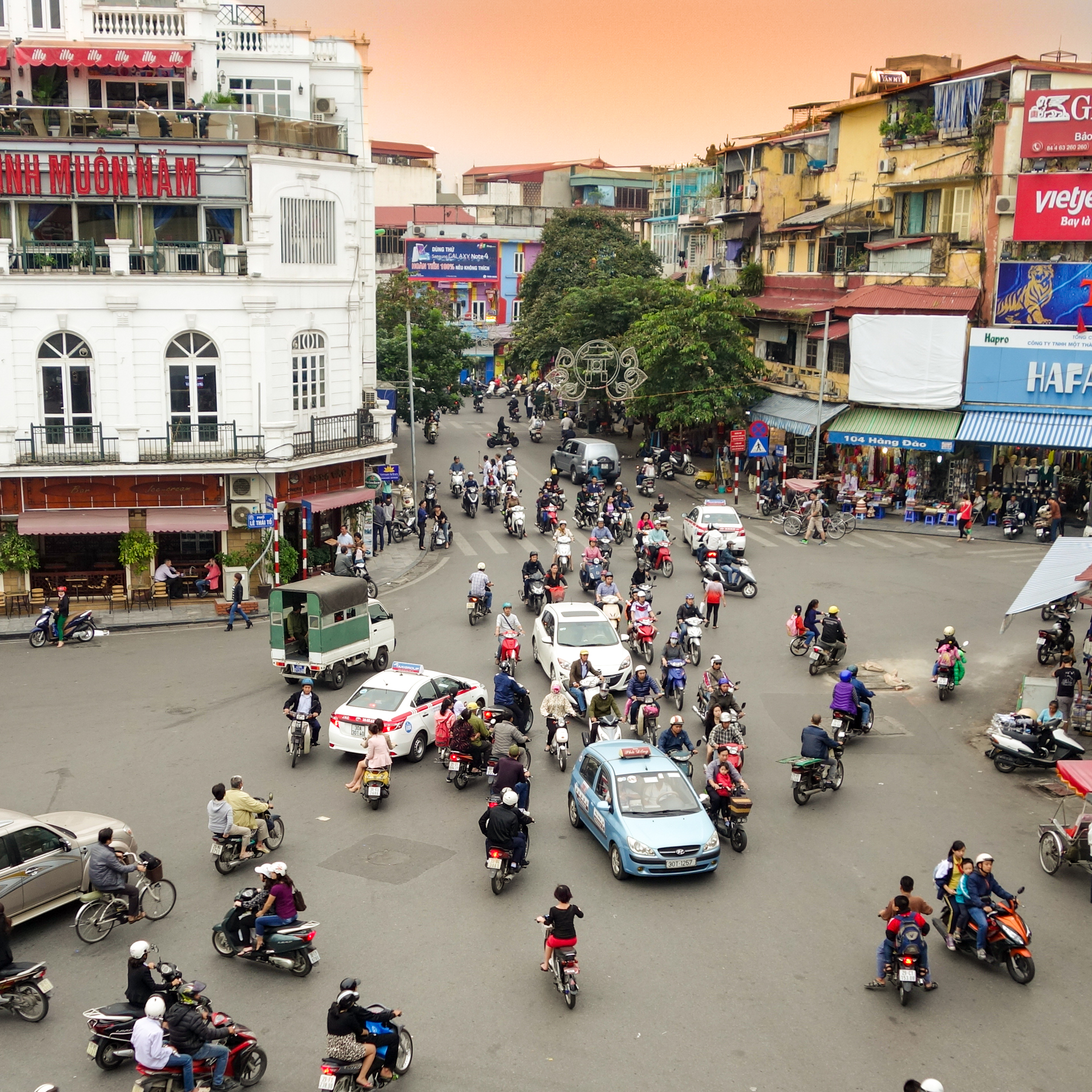 Crossing The Road In Vietnam Stock Photo - Download Image Now