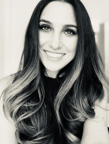 Casey Dickinson, owner and lead Chicago bridal airbrush makeup artist