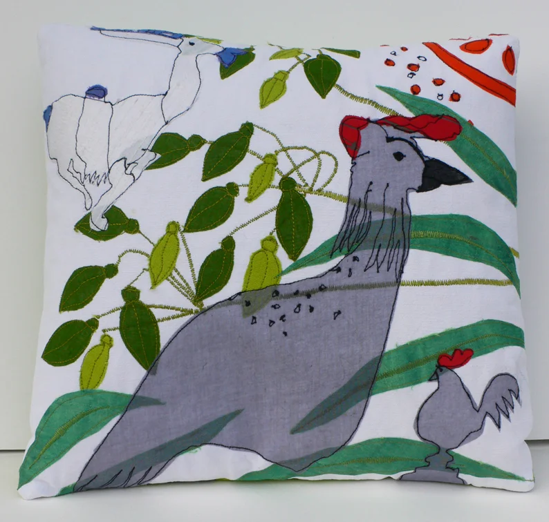 Images or this cushion came from details of decorations on the pots in the ceramics gallery alongside seed heads and leaves of the agapanthus in the courtyard of the V and A. 