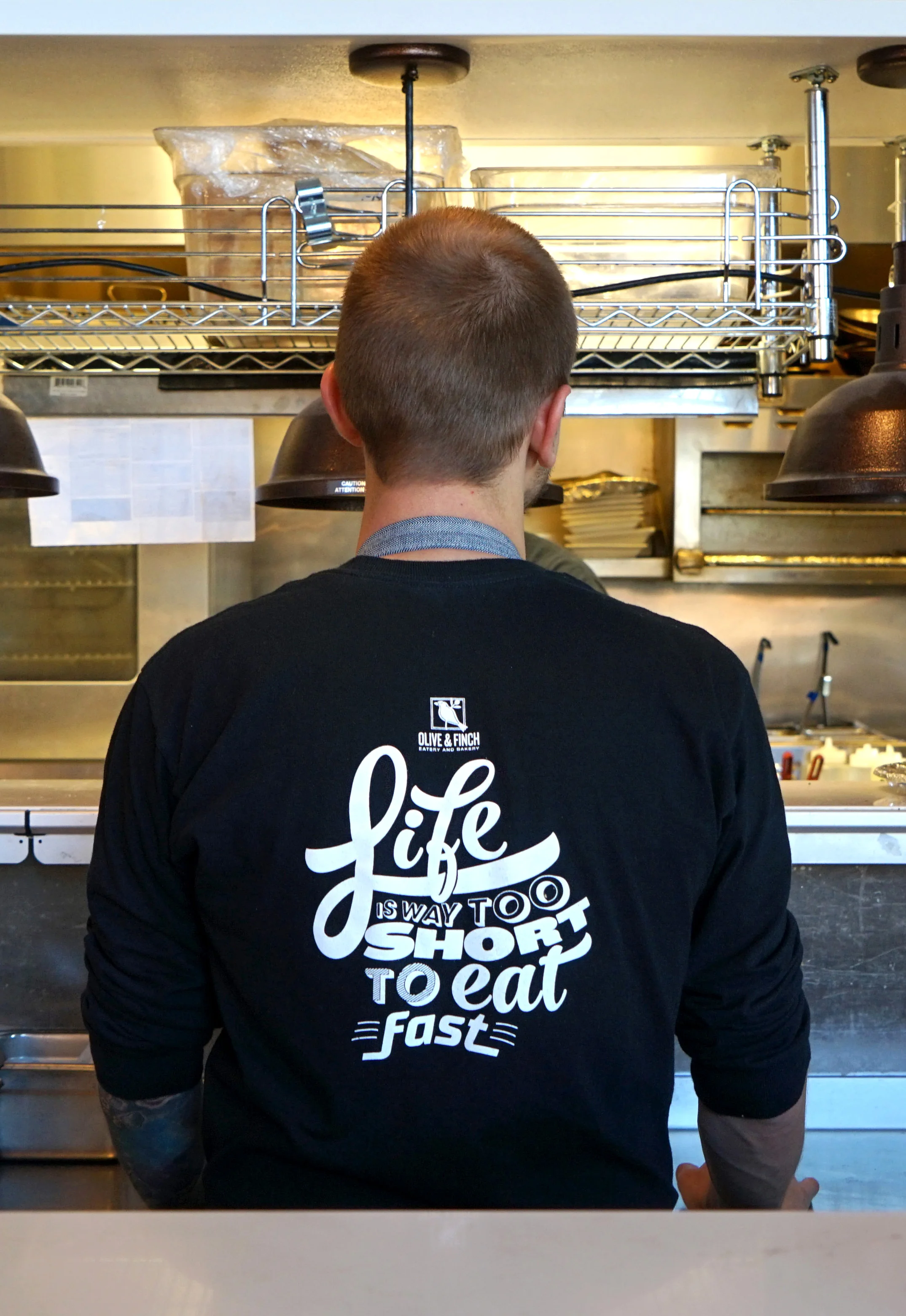 Both t-shirt designs were printed and are currently worn by the staff. The designs were printed on the back because all employees are required to wear aprons.