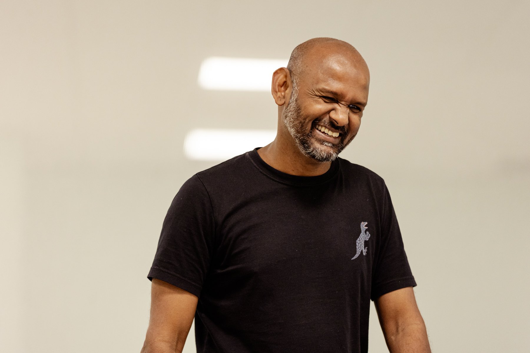  Photo of actor Ramesh Meyyappan in the rehearsal room. He is in the middle of laughing! 