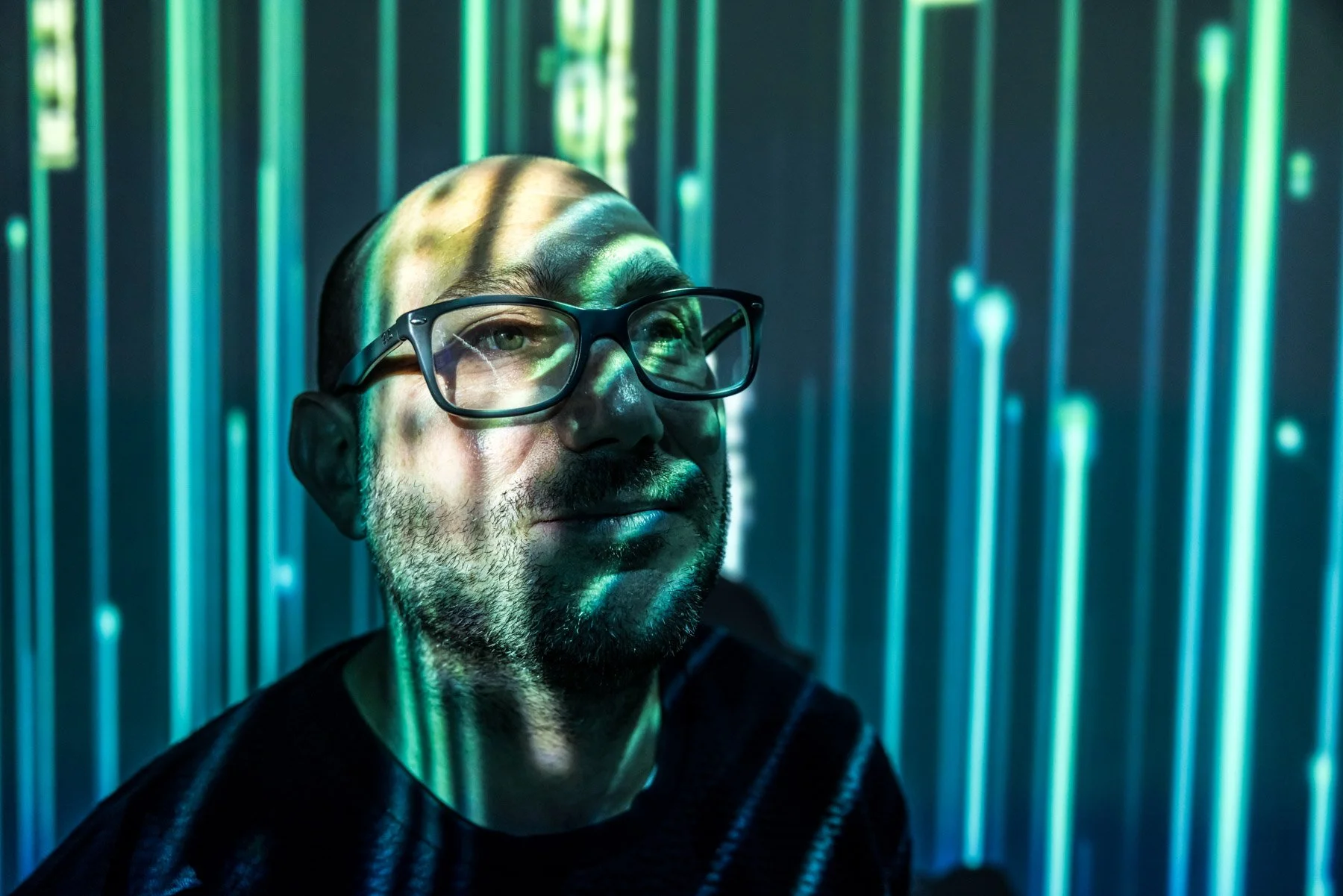 Experiential brand photography of man in projection space