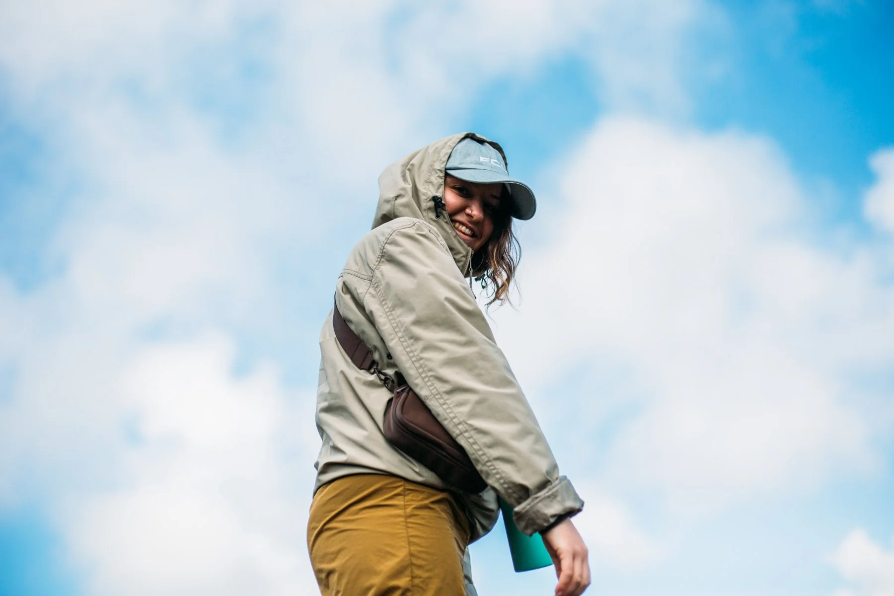 Gemma standing in Welsh countryside landscape